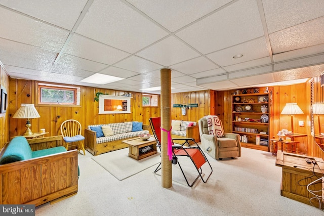 615 Convent Rd, Aston, PA 19014 - carpeted living area with wooden walls, built in features, and a paneled ceiling