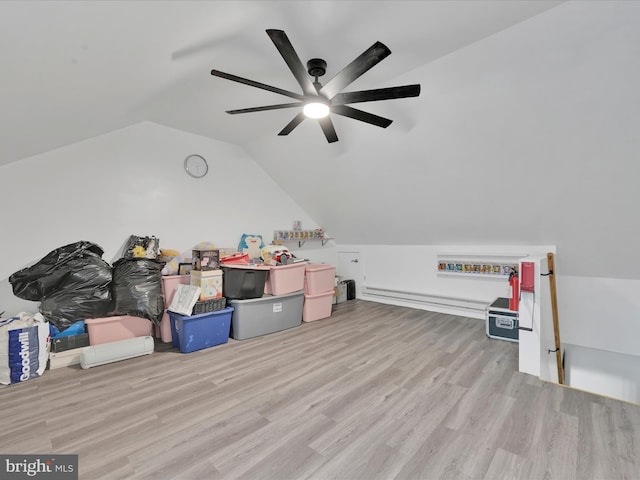 702 N Warren St, Orwigsburg, PA 17961 - additional living space with wood finished floors, lofted ceiling, and ceiling fan