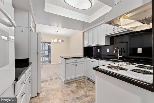 3622 Gleneagles Dr Unit 9-2C, Silver Spring, MD 20906 - kitchen featuring white appliances, a chandelier, range hood, a peninsula, and dark countertops