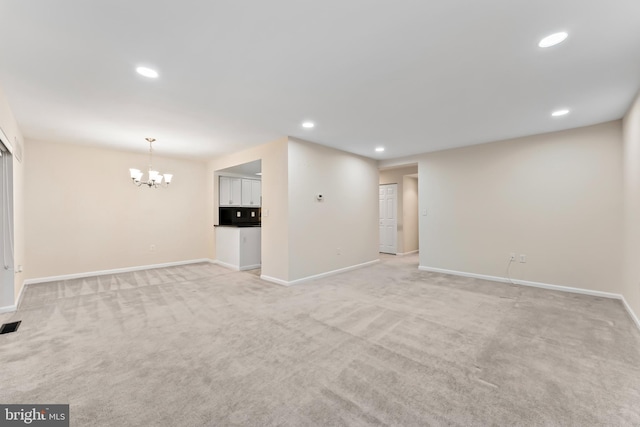 3622 Gleneagles Dr Unit 9-2C, Silver Spring, MD 20906 - unfurnished living room with a chandelier, light colored carpet, and recessed lighting