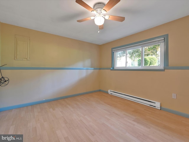 171 Tanglewood Ln, Lancaster, PA 17601 - empty room featuring baseboard heating, wood finished floors, and a ceiling fan