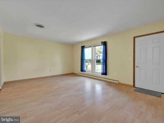 171 Tanglewood Ln, Lancaster, PA 17601 - spare room featuring a baseboard radiator and light wood-style flooring