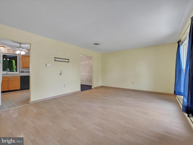 171 Tanglewood Ln, Lancaster, PA 17601 - unfurnished living room with light wood-style flooring and a ceiling fan