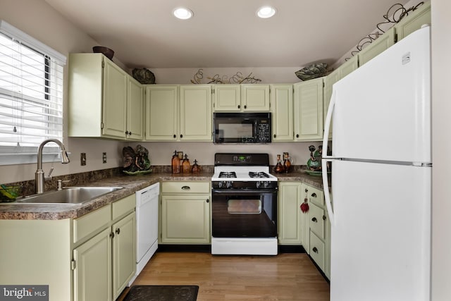 811 Darrett Ct, Sewell, NJ 08080 - kitchen featuring white appliances, recessed lighting, dark countertops, and light wood-type flooring