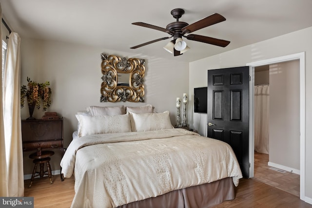 811 Darrett Ct, Sewell, NJ 08080 - bedroom with wood finished floors and ceiling fan