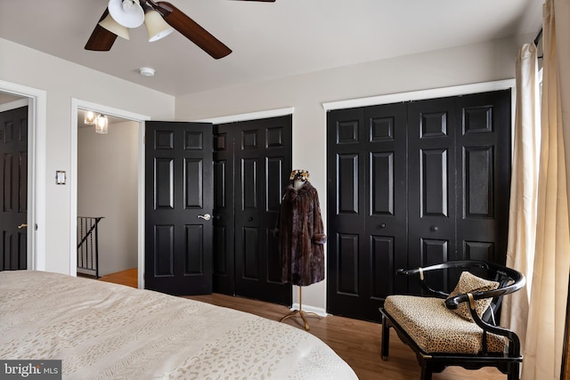 811 Darrett Ct, Sewell, NJ 08080 - bedroom featuring two closets, wood finished floors, and a ceiling fan