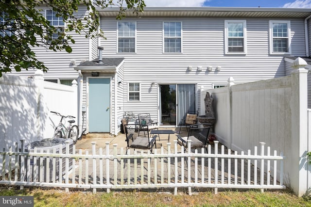 811 Darrett Ct, Sewell, NJ 08080 - rear view of house featuring a patio area and a fenced backyard