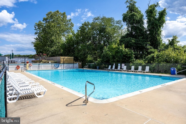 811 Darrett Ct, Sewell, NJ 08080 - community pool featuring a patio area and view of wooded area
