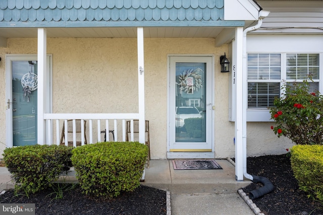 811 Darrett Ct, Sewell, NJ 08080 - view of exterior entry featuring stucco siding