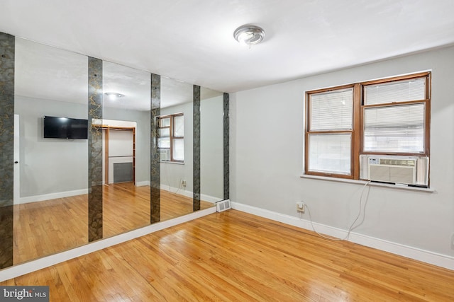 2847 S 65th St, Philadelphia, PA 19142 - unfurnished bedroom with cooling unit and wood finished floors