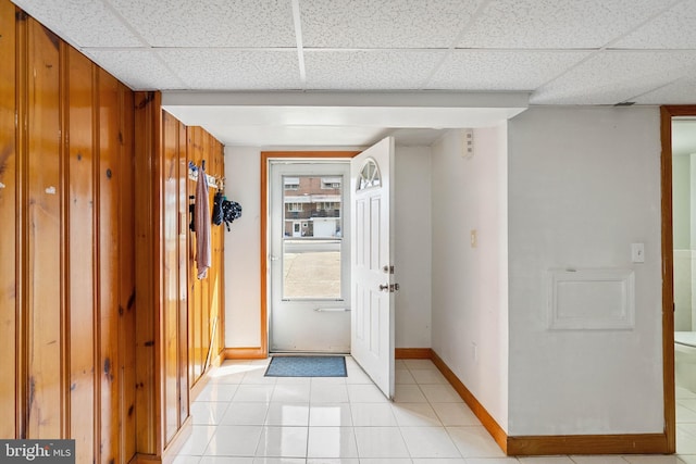 2847 S 65th St, Philadelphia, PA 19142 - entryway with light tile patterned flooring, a paneled ceiling, and wood walls