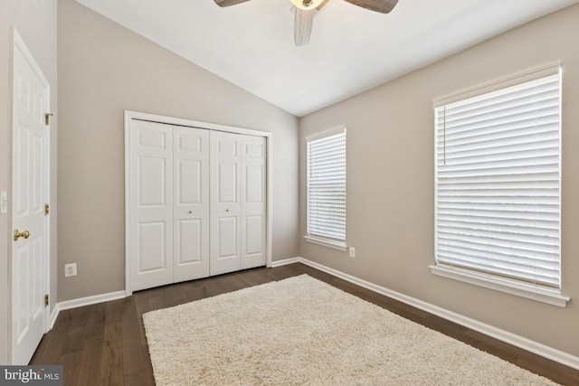 44203 Litchfield Ter, Ashburn, VA 20147 - unfurnished bedroom with dark wood finished floors, lofted ceiling, a closet, and ceiling fan