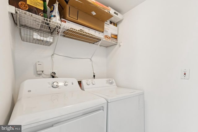 44203 Litchfield Ter, Ashburn, VA 20147 - washroom featuring separate washer and dryer