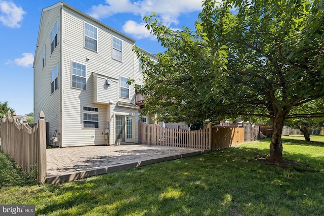 44203 Litchfield Ter, Ashburn, VA 20147 - back of property with a patio