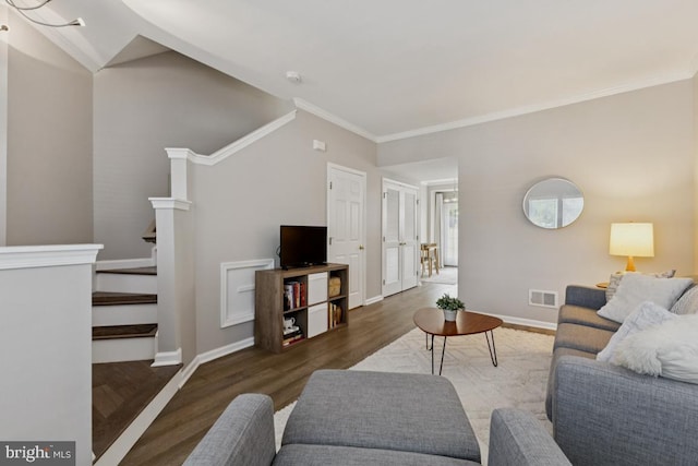 44203 Litchfield Ter, Ashburn, VA 20147 - living area with stairway, wood finished floors, and ornamental molding