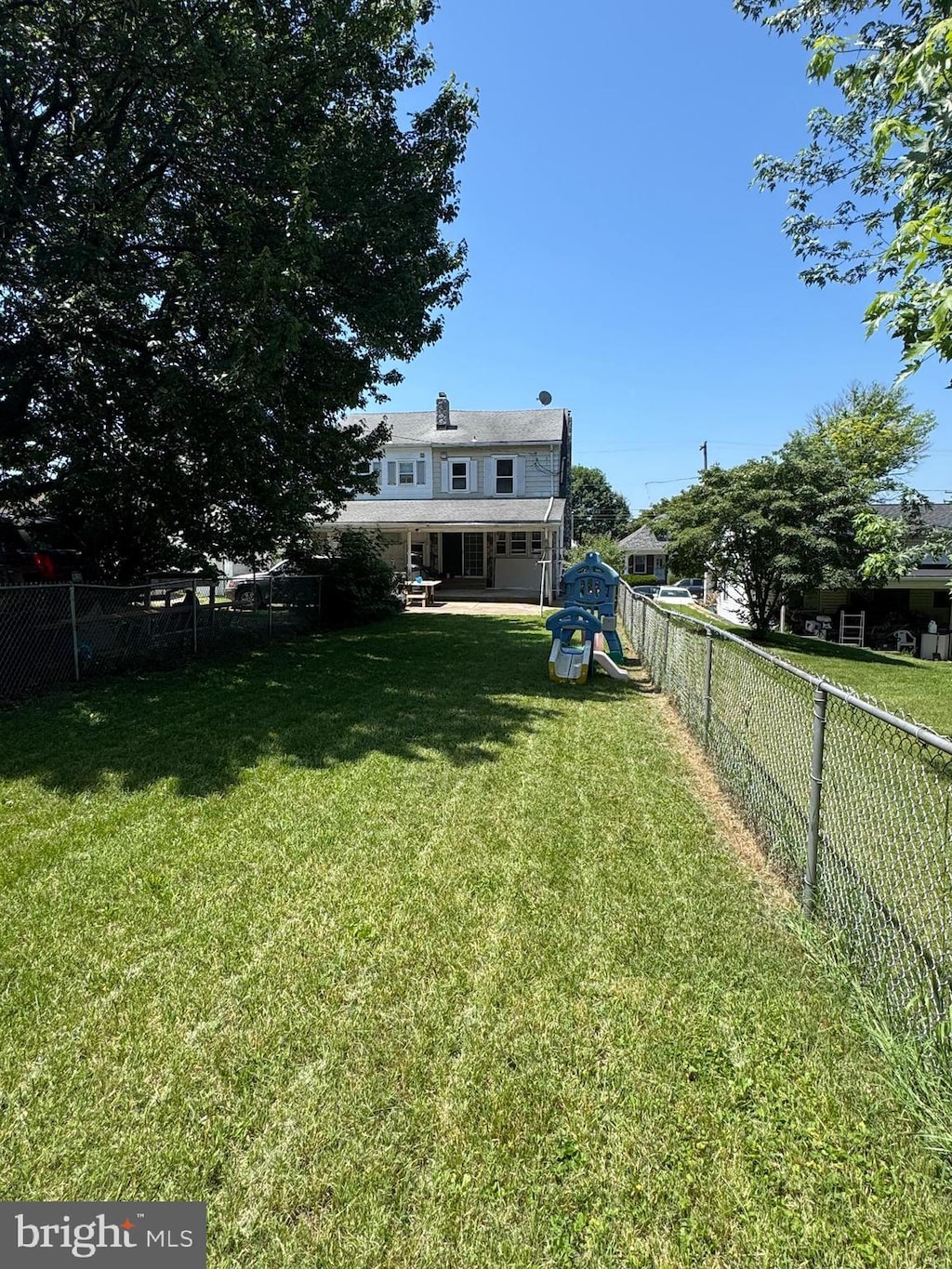 3319 Holtry St, Reading, PA 19605 - fenced backyard featuring a playground