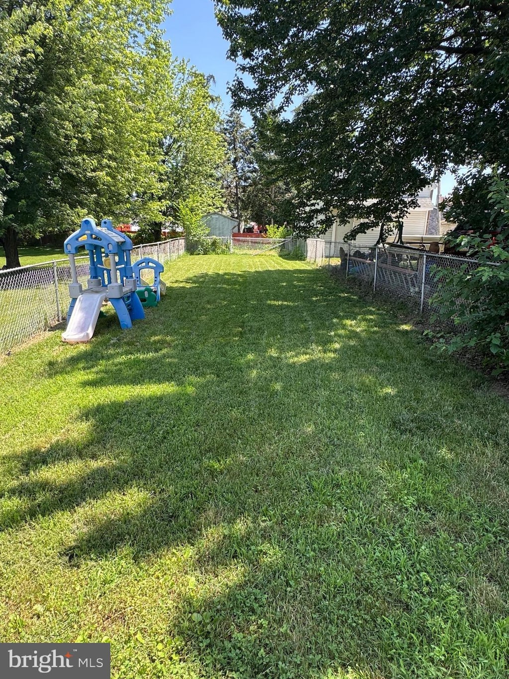 3319 Holtry St, Reading, PA 19605 - fenced backyard featuring a playground