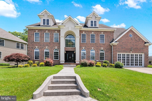 3213 Hatton Rd, Baltimore, MD 21208 - colonial-style house with brick siding, a front yard, and concrete driveway