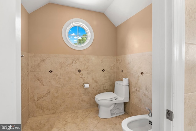 3213 Hatton Rd, Baltimore, MD 21208 - full bath with tile walls, a bidet, vaulted ceiling, tile patterned flooring, and wainscoting