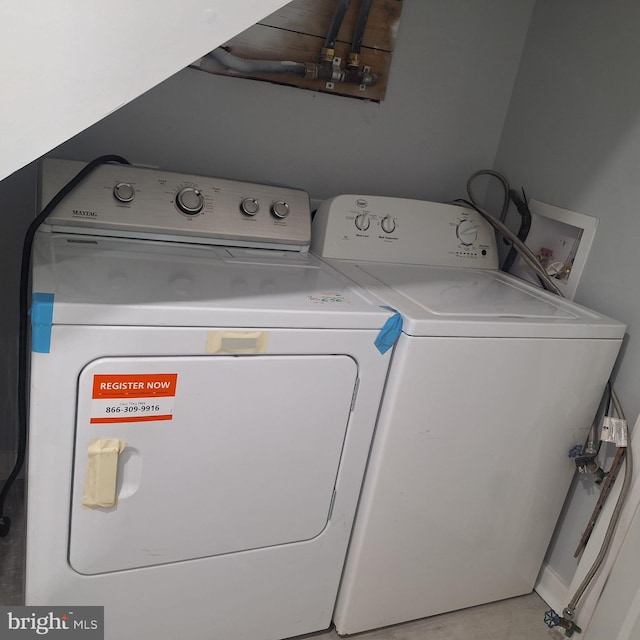 1716 N Monroe St, Baltimore, MD 21217 - laundry area featuring independent washer and dryer and light tile patterned flooring