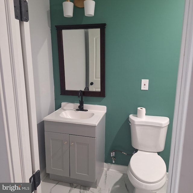 1716 N Monroe St, Baltimore, MD 21217 - half bath with vanity and marble finish floors