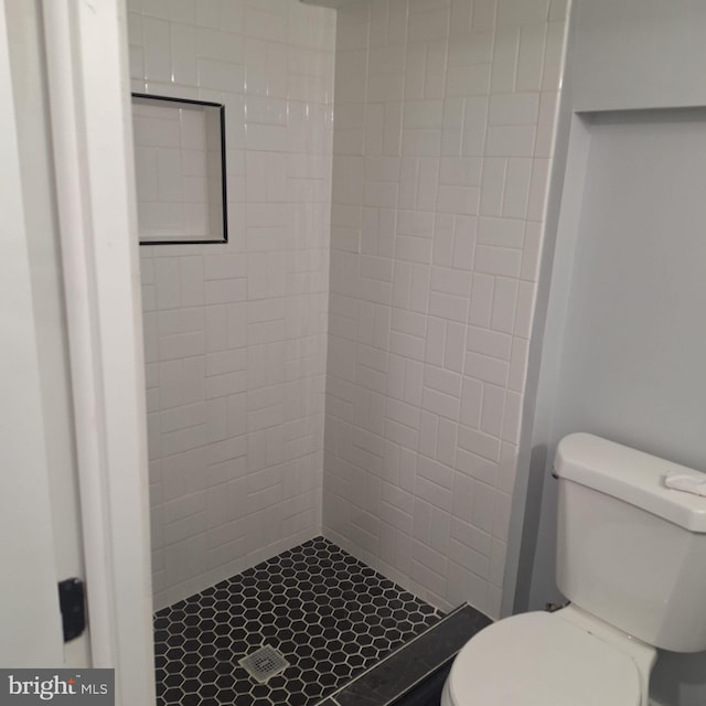 1716 N Monroe St, Baltimore, MD 21217 - full bathroom featuring a shower stall and toilet