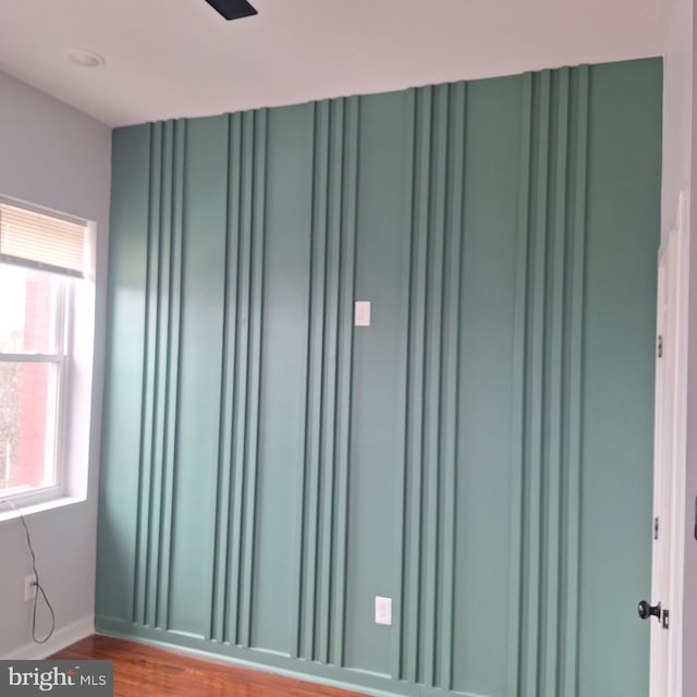 1716 N Monroe St, Baltimore, MD 21217 - unfurnished room featuring wood finished floors and baseboards