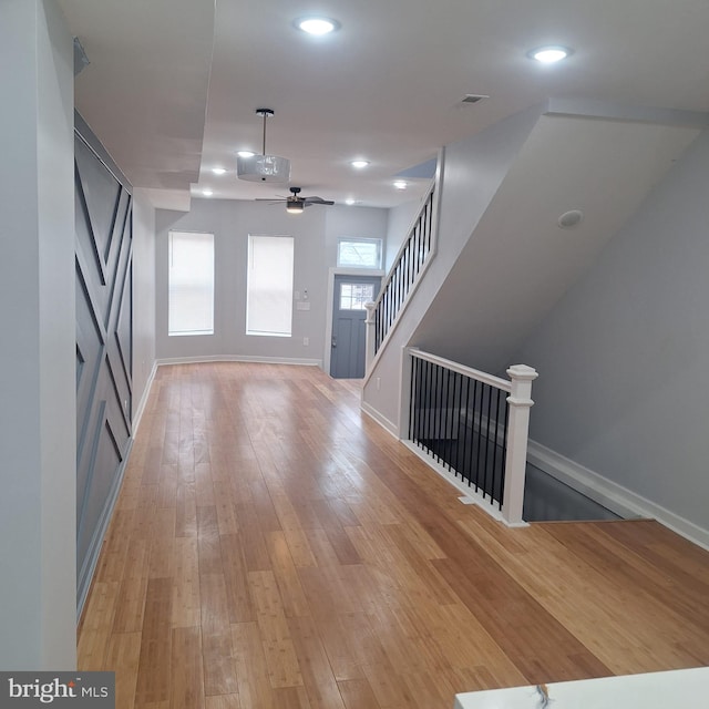 1716 N Monroe St, Baltimore, MD 21217 - unfurnished living room with a ceiling fan, recessed lighting, and light wood-style flooring
