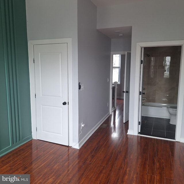1716 N Monroe St, Baltimore, MD 21217 - corridor featuring baseboards and wood finished floors