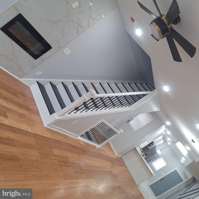 1716 N Monroe St, Baltimore, MD 21217 - staircase featuring ceiling fan and wood finished floors