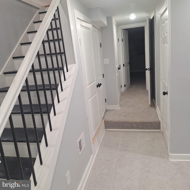 1716 N Monroe St, Baltimore, MD 21217 - corridor with stairway, carpet, and tile patterned floors