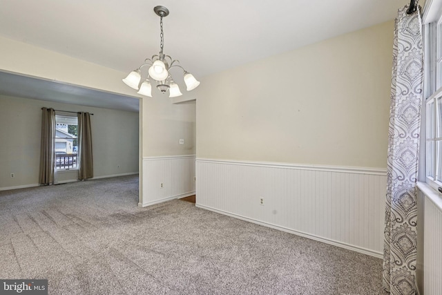 1207 Avalon Blvd, Shady Side, MD 20764 - carpeted spare room featuring a chandelier and wainscoting