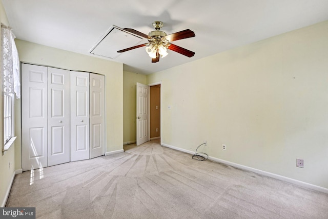 1207 Avalon Blvd, Shady Side, MD 20764 - unfurnished bedroom featuring attic access, carpet flooring, a closet, and ceiling fan