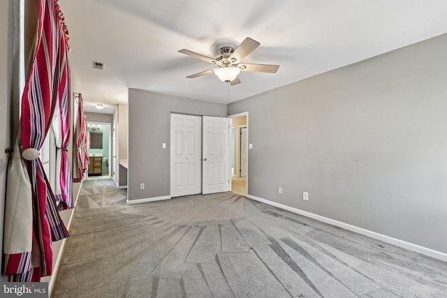 1207 Avalon Blvd, Shady Side, MD 20764 - unfurnished bedroom featuring carpet flooring, a closet, and ceiling fan