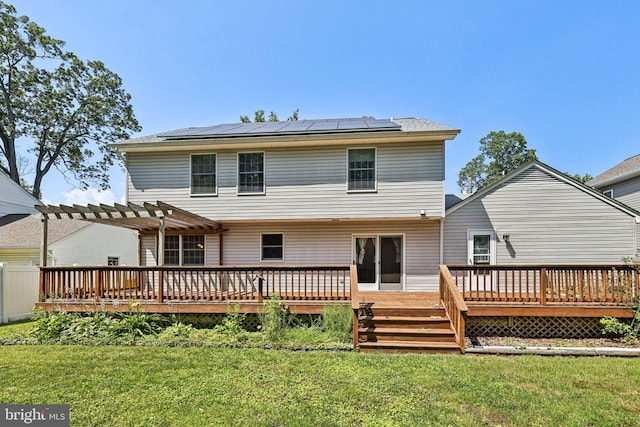 1207 Avalon Blvd, Shady Side, MD 20764 - back of house featuring a pergola, solar panels, a yard, and a deck