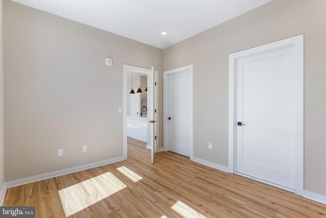 1358 Florida Ave NE Unit Ph-02, Washington, DC 20002 - unfurnished bedroom with light wood-style floors and recessed lighting