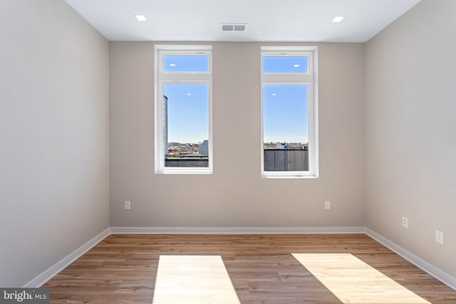 1358 Florida Ave NE Unit Ph-02, Washington, DC 20002 - unfurnished room featuring wood finished floors and plenty of natural light