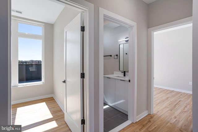 1358 Florida Ave NE Unit Ph-02, Washington, DC 20002 - corridor featuring light wood finished floors and baseboards