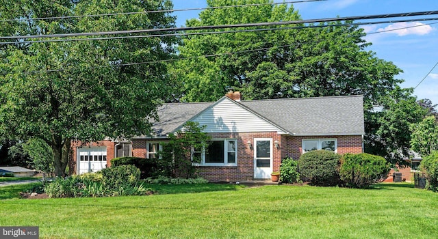102 Deaven Rd, Harrisburg, PA 17112 - view of front of house with brick siding, a front lawn, a chimney, and an attached garage