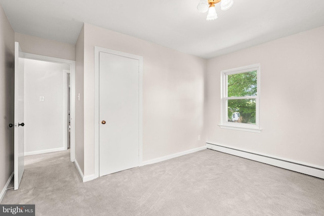 102 Deaven Rd, Harrisburg, PA 17112 - unfurnished bedroom featuring carpet, baseboard heating, and a closet