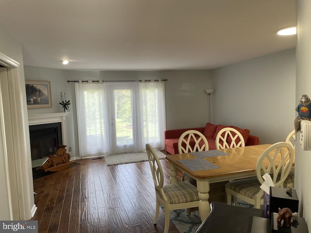202 Meadow Ct Unit 202, Glen Mills, PA 19342 - dining room featuring hardwood / wood-style floors and a fireplace