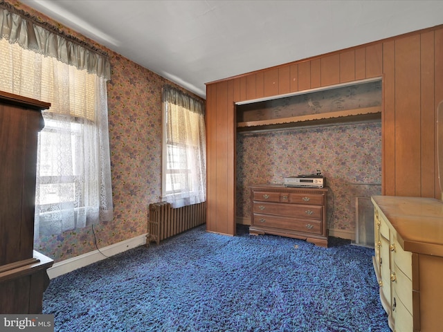 234 N Coal St, Port Carbon, PA 17965 - unfurnished bedroom with radiator, wallpapered walls, and carpet floors