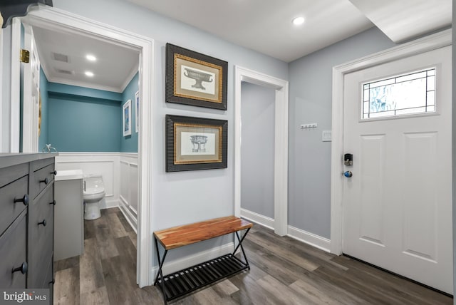 1555 Lukens Ave, Abington, PA 19001 - foyer entrance with dark wood-type flooring, recessed lighting, wainscoting, and crown molding