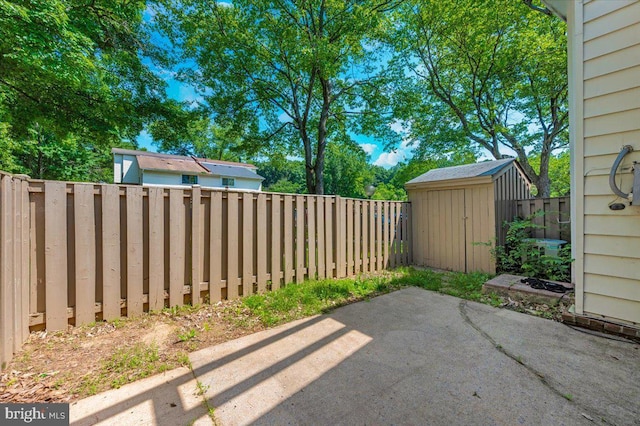 18503 Nutmeg Pl, Germantown, MD 20874 - fenced backyard with a patio and a shed