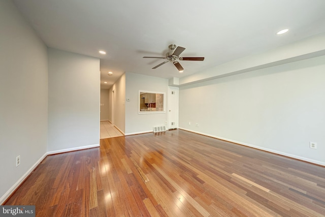 8218 Carrleigh Pkwy Unit 10, Springfield, VA 22152 - unfurnished room with a ceiling fan, wood finished floors, and recessed lighting