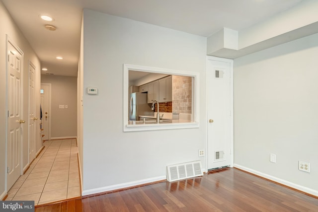 8218 Carrleigh Pkwy Unit 10, Springfield, VA 22152 - spare room featuring recessed lighting and wood finished floors