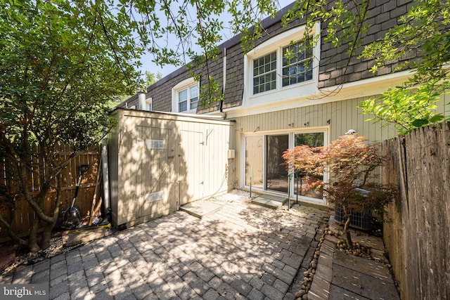 8218 Carrleigh Pkwy Unit 10, Springfield, VA 22152 - view of patio / terrace featuring a shed