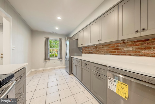 8218 Carrleigh Pkwy Unit 10, Springfield, VA 22152 - kitchen featuring stainless steel appliances, gray cabinets, light countertops, and recessed lighting