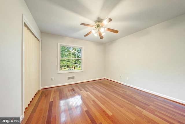 8218 Carrleigh Pkwy Unit 10, Springfield, VA 22152 - unfurnished bedroom with wood-type flooring, a closet, and ceiling fan