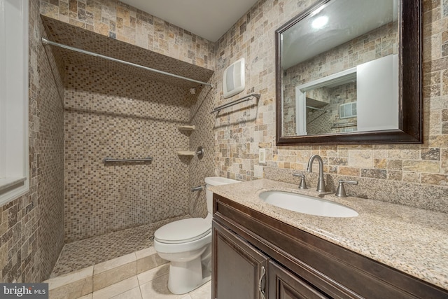 8218 Carrleigh Pkwy Unit 10, Springfield, VA 22152 - full bath with tiled shower, tile walls, vanity, and tile patterned floors